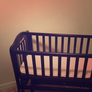 Dark cherry wood cradle. Gently used.